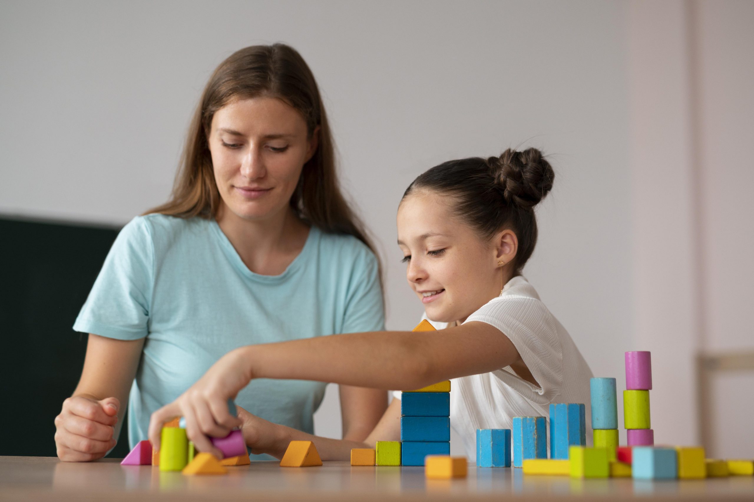 psychologist-helping-girl-speech-therapy Occupational Therapy